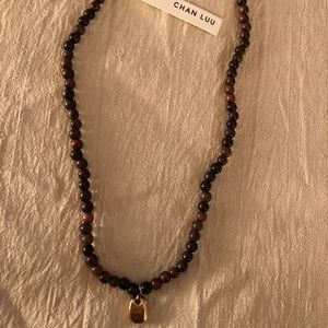 Chan Luu wooden beaded necklace with gold pendant